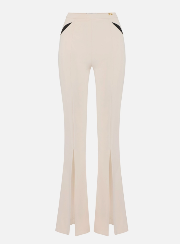 TROUSERS WITH CUT-OUTS AND SLITS