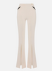 TROUSERS WITH CUT-OUTS AND SLITS